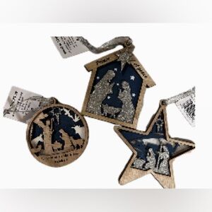 Set of Three Wooden Blazer Etched Nativity ornament set.